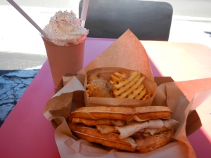 My lunch at Bruxie, a turkey club on a waffle, with waffle fries and a Belgium chocolate milkshake.