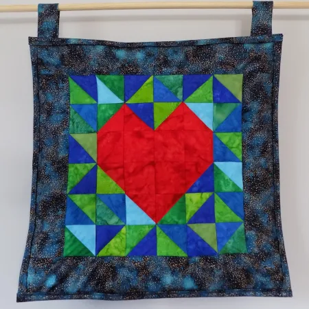 Image of hanging quilt I HeART Earth Science