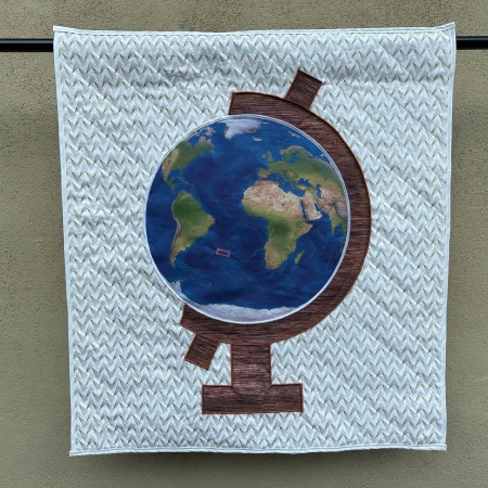 hanging quilt of a globe