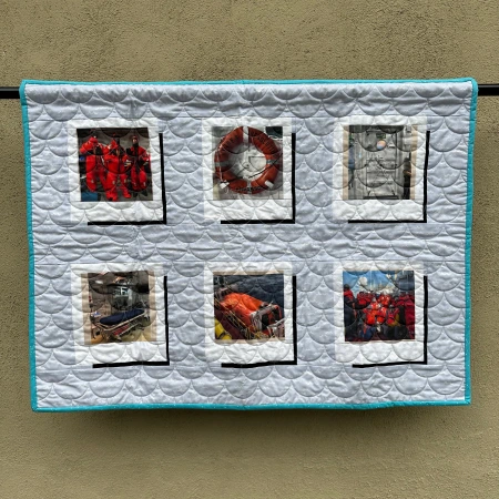 Hanging quilt with six safety images